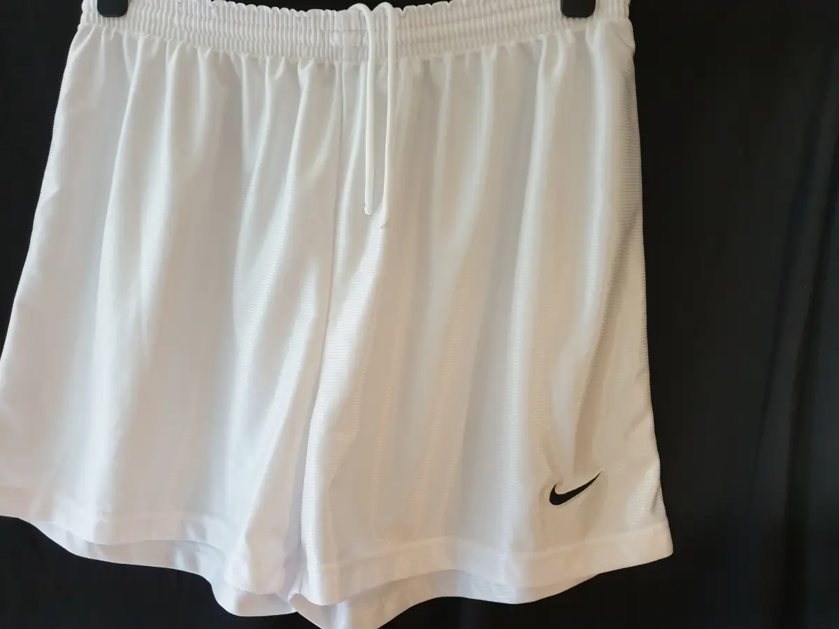 pair of mens Nike white shorts