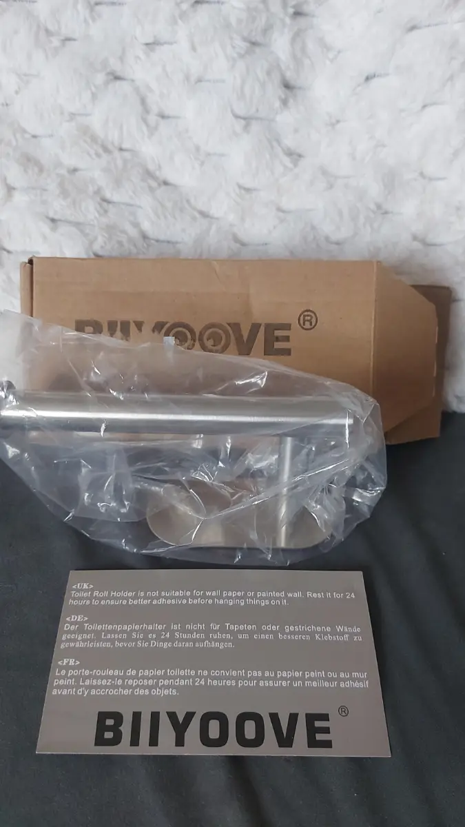 Brand new silver adhesive toilet roll holder