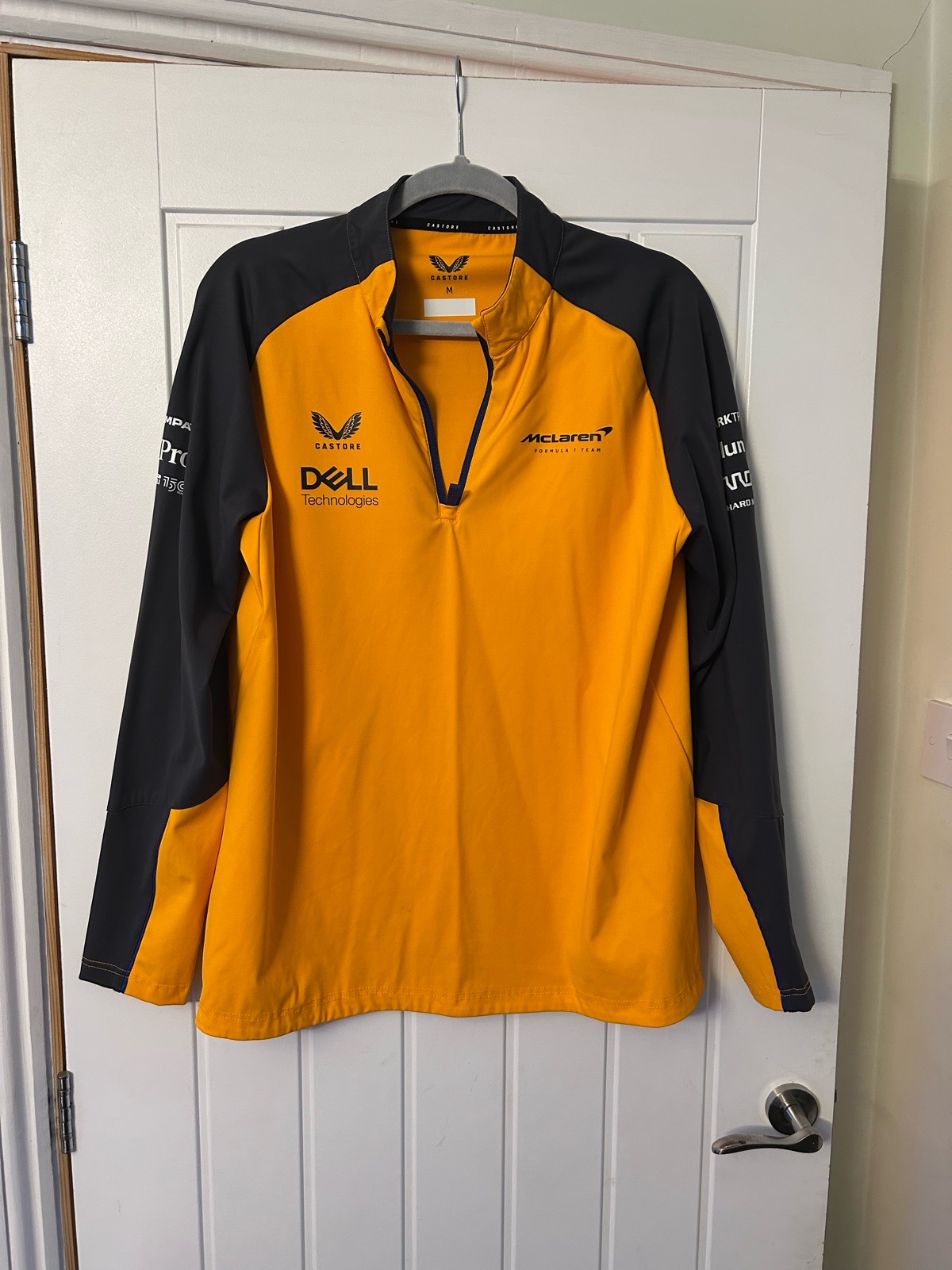 Castore 1/4 Zip McLaren F1 Team Top, Size Medium.