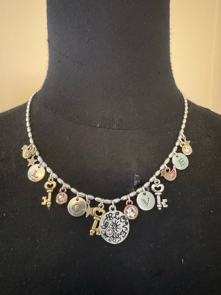 Gold and silver tone love charm necklace