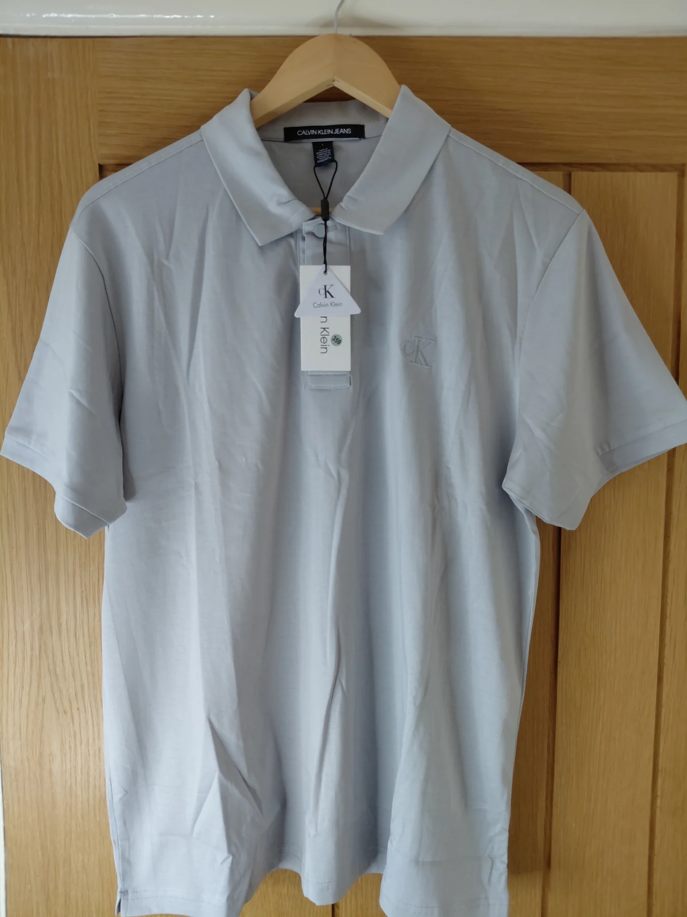 BNWT Calvin Klein Polo Top Grey L