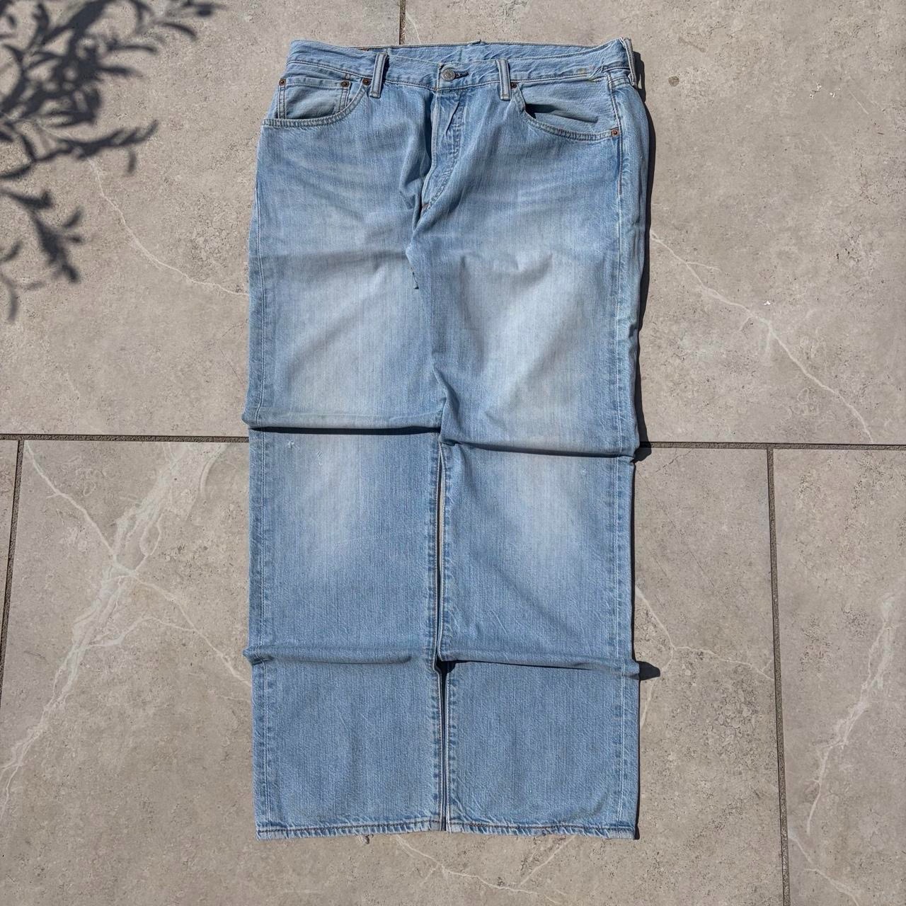 Levi's 501 Light Blue Distressed Denim Jeans