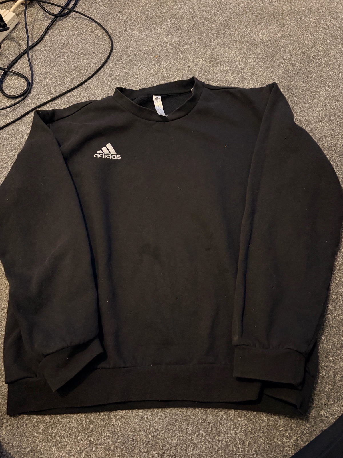 Adidas black crew neck sweatshirt in women’s size M.