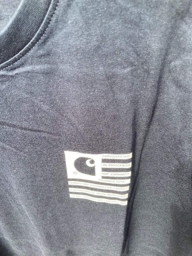 Carhartt navy teeshirt with motif on front and  back. Size M