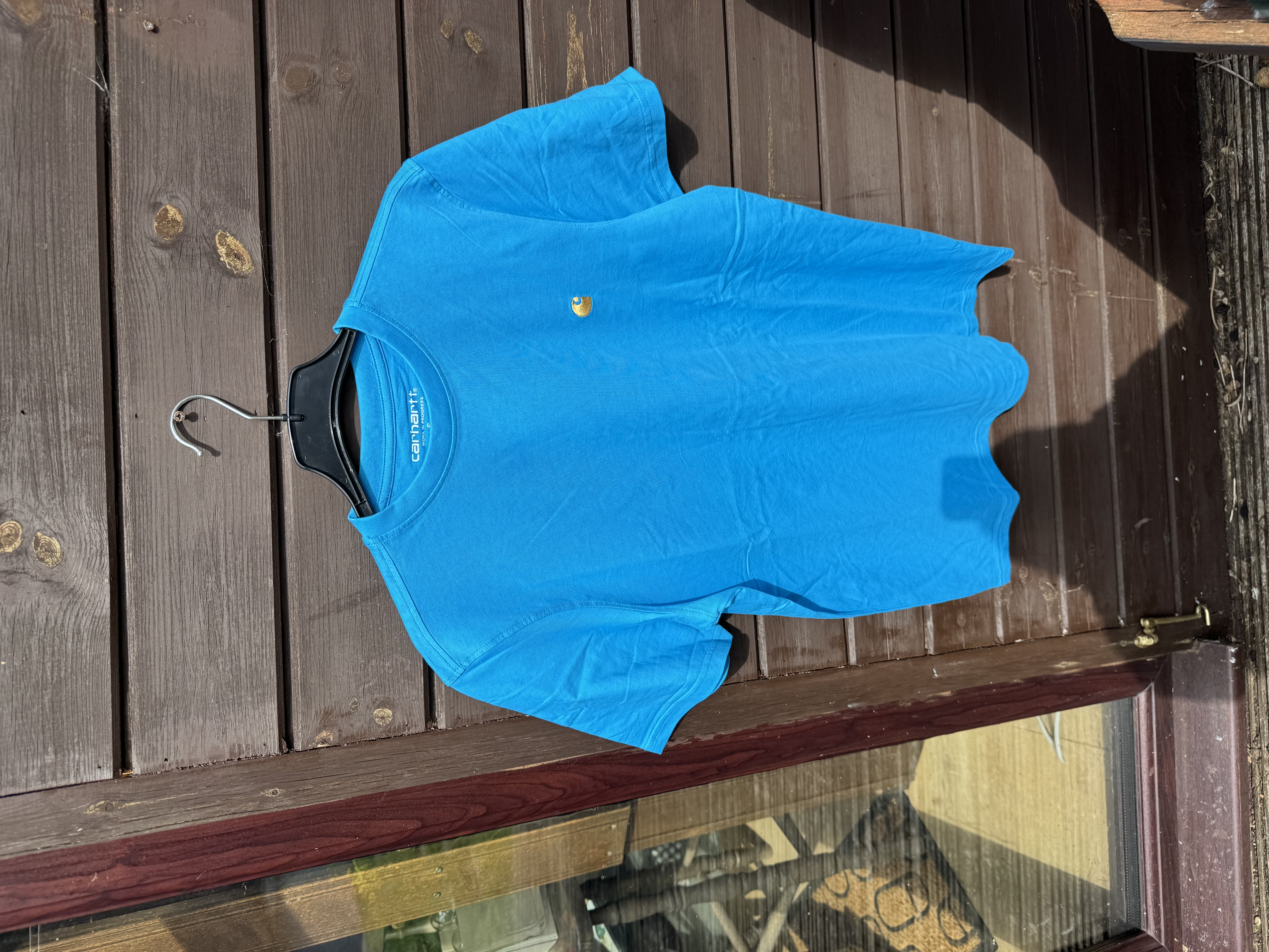 Men’s sky blue carhartt teeshirt. Size M