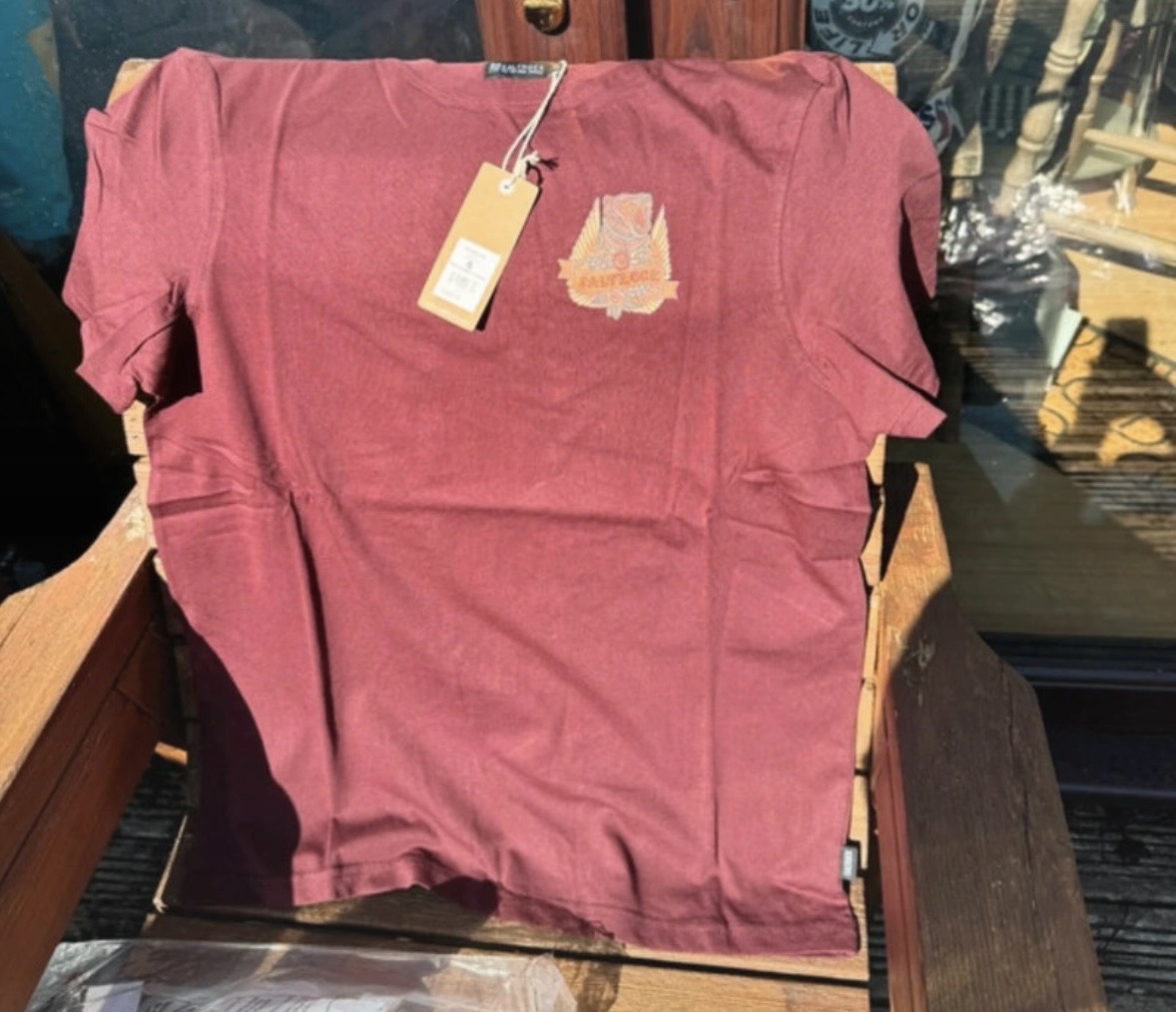 Saltrock burgundy cotton teeshirt with motif on front and back. Size S