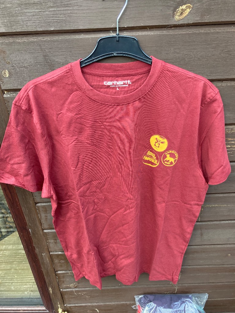 Carhartt Red teeshirt with motif on front and back. Size L