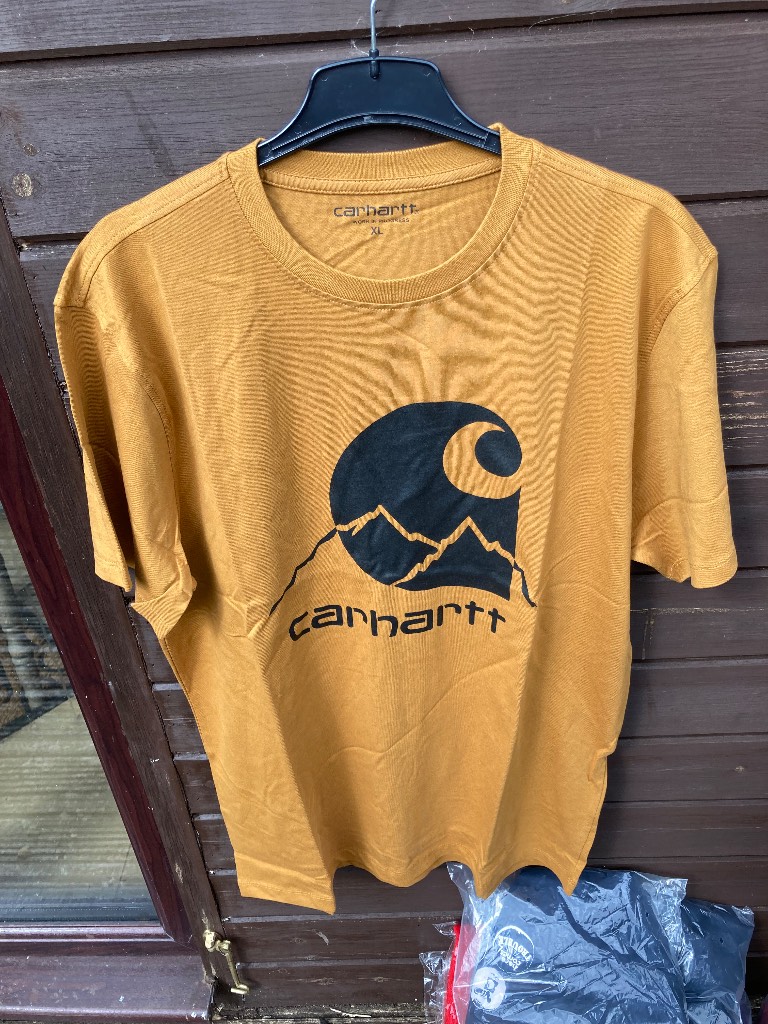 Carhartt mustard teeshirt with motif on front. Size XL