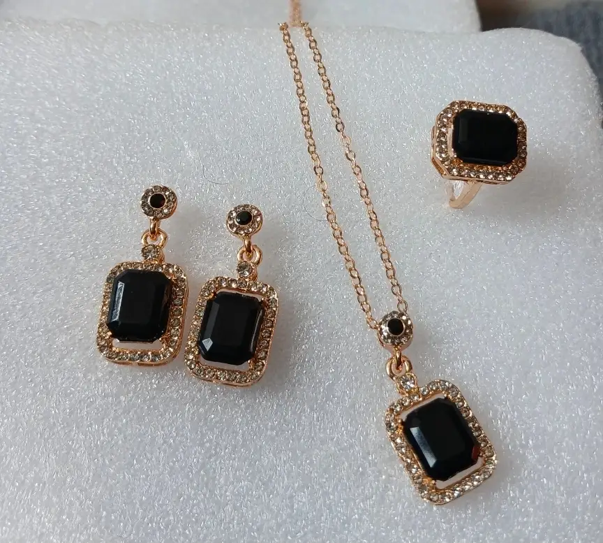 3-piece jewelry set featuring a necklace, earrings, and a ring.