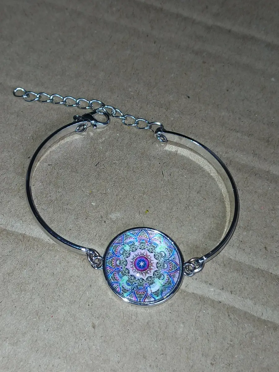 silver-toned bangle bracelet.