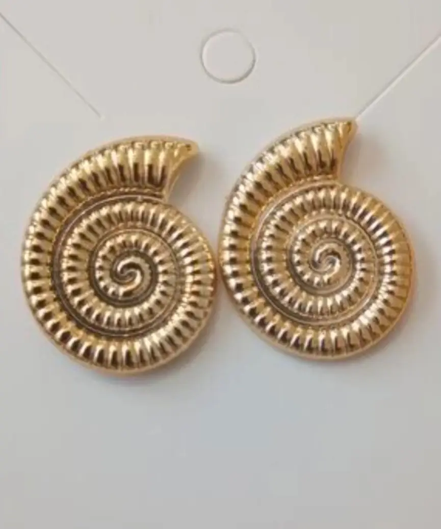 statement spiral seashell earring.