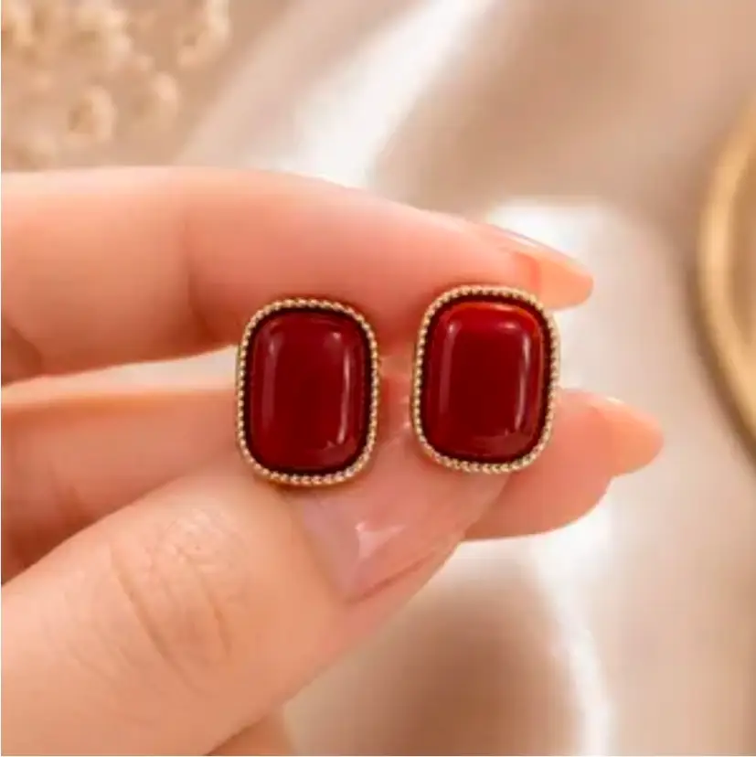 vintage-style geometric rectangle stud earrings.