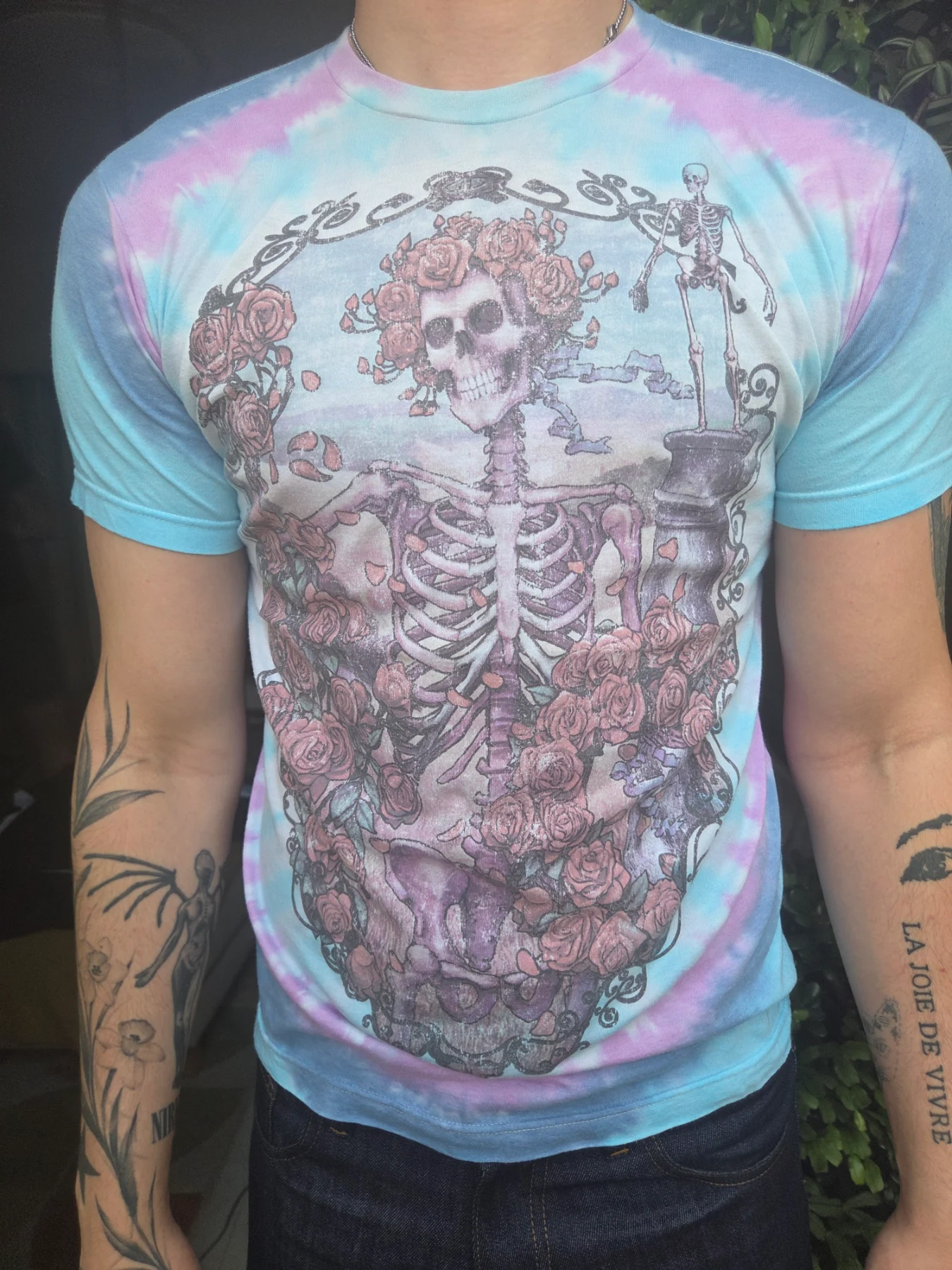 Grateful Dead Liquid Blue pastel tie-dye skeleton graphic T-shirt. Official Liquid Blue vintage-styl