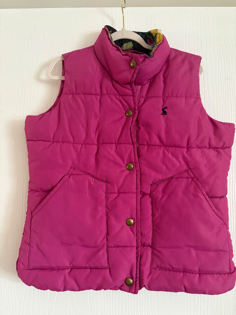 Pink joules body warmer with inside floral pattern