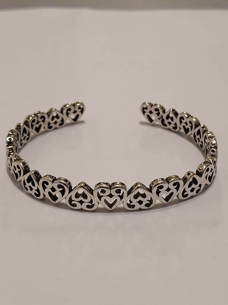 Silver marked adjustable heart design bangle