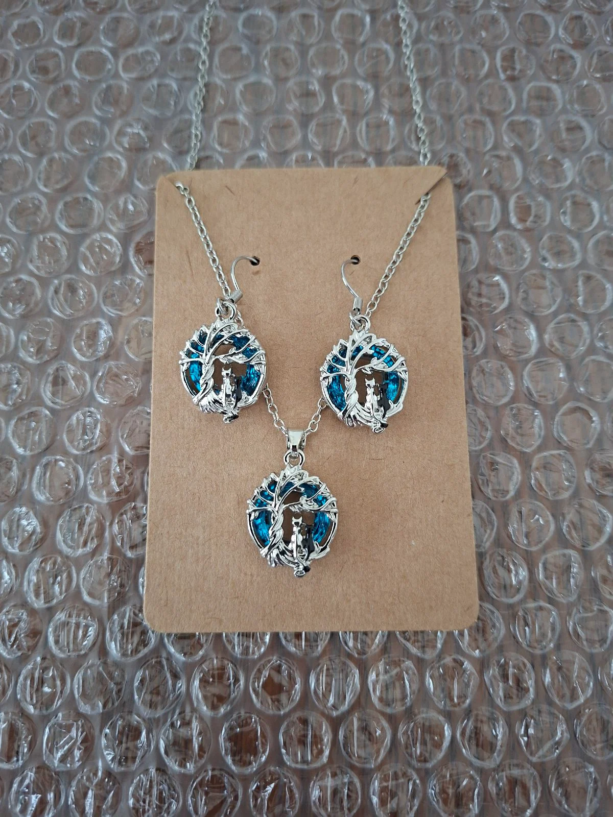 Blue And Silver Cats Under Tree Necklace And Earrings Set