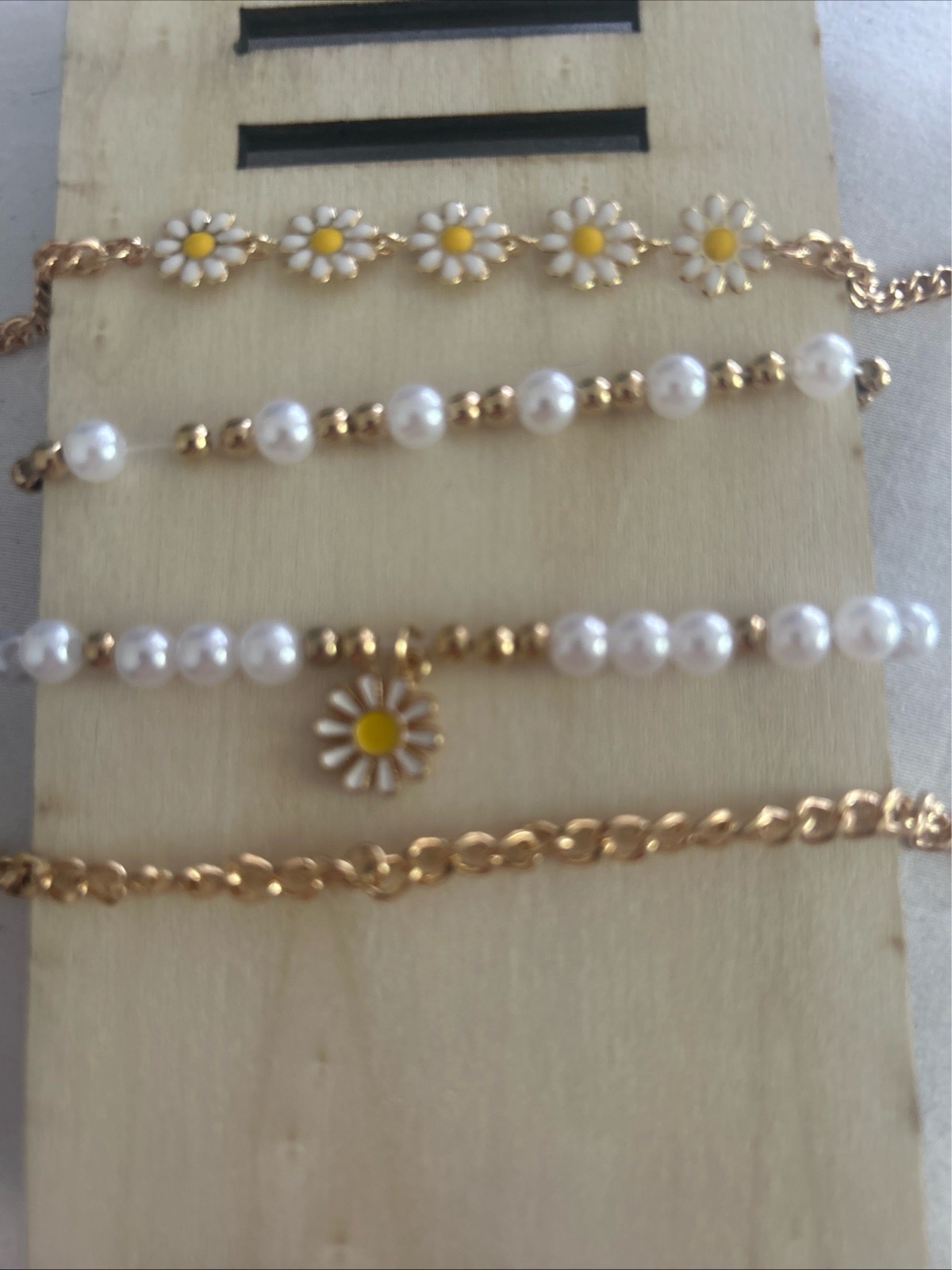 4pcs Bracelet Set with Star, Flower, and Daisy Charms in Faux Pearl Beads