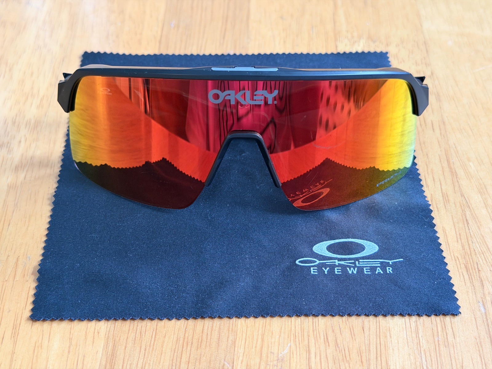 Oakley Sutro Custom Prizm Mirrored Wrap Sunglasses Black  Frame Red Lens