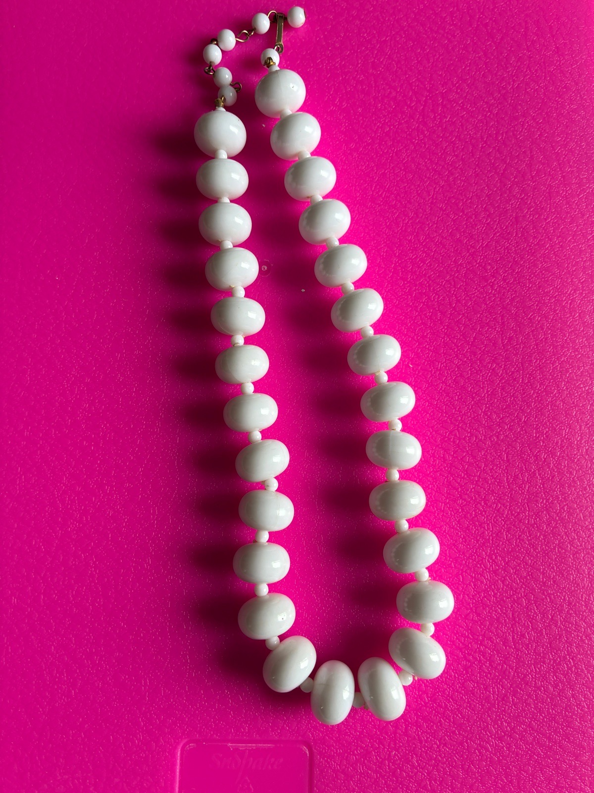 White bead necklace