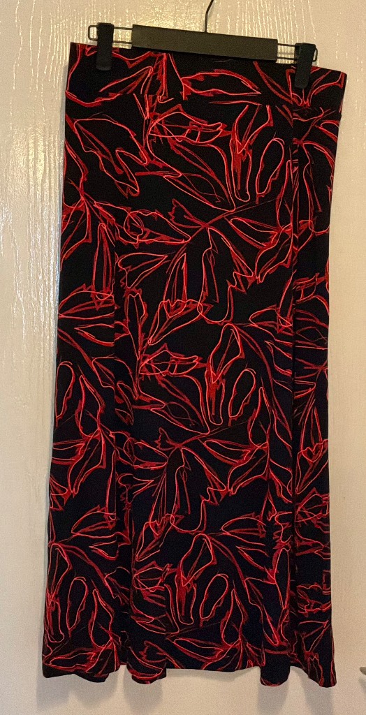 Roman size 10 gorgeous A line skirt . Black and abstract design.  New without tags