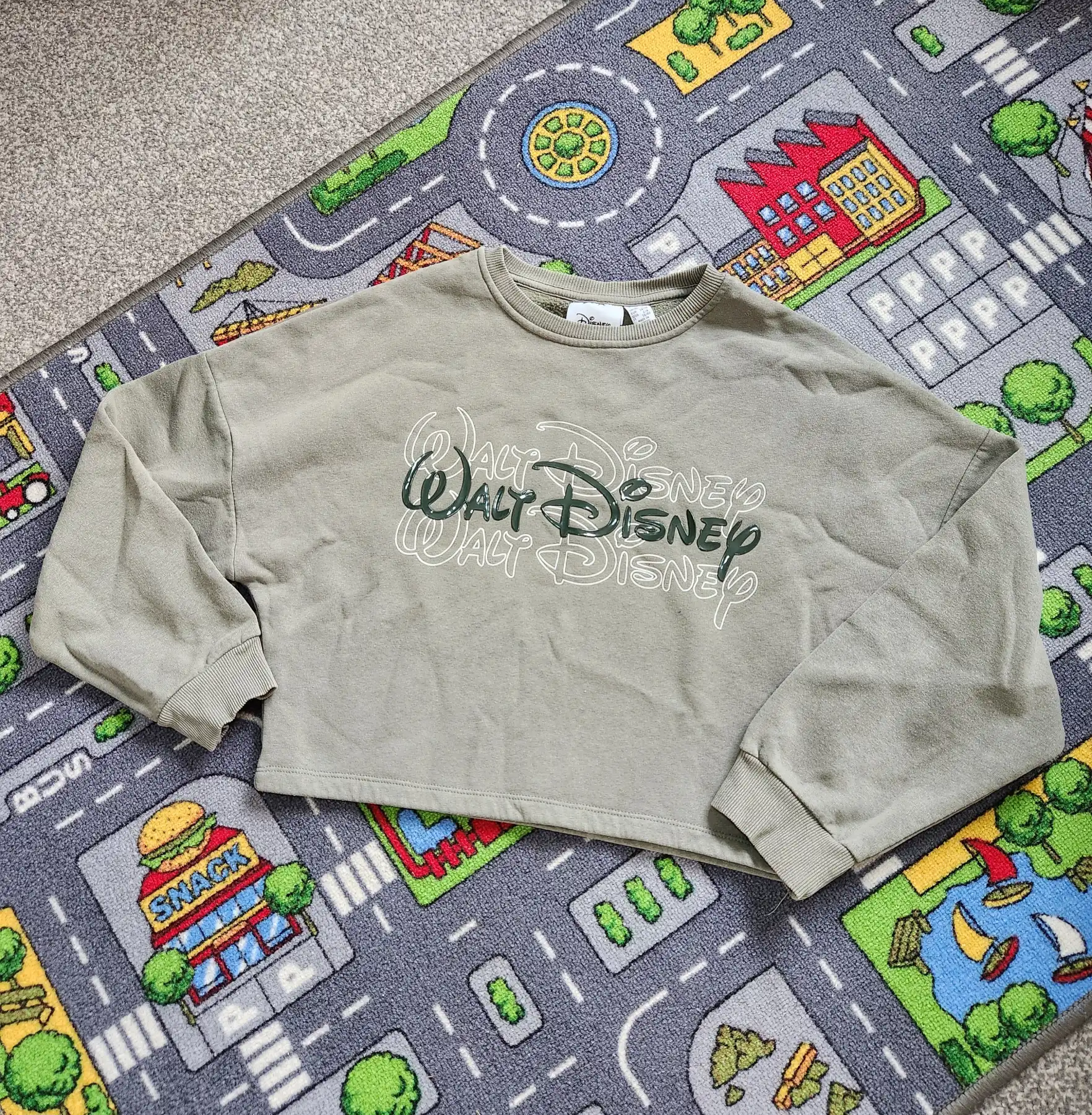 Disney Women’s Logo Graphic Fleece Crew Neck Pullover Short Sweatshirt Khaki XS