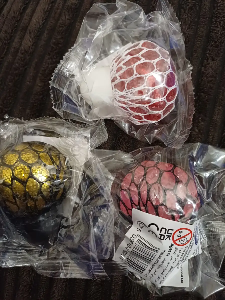 Three Small glittery Squishy balls