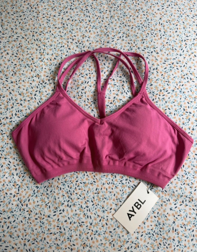 Women’s pink power seamless sports bra in a size large