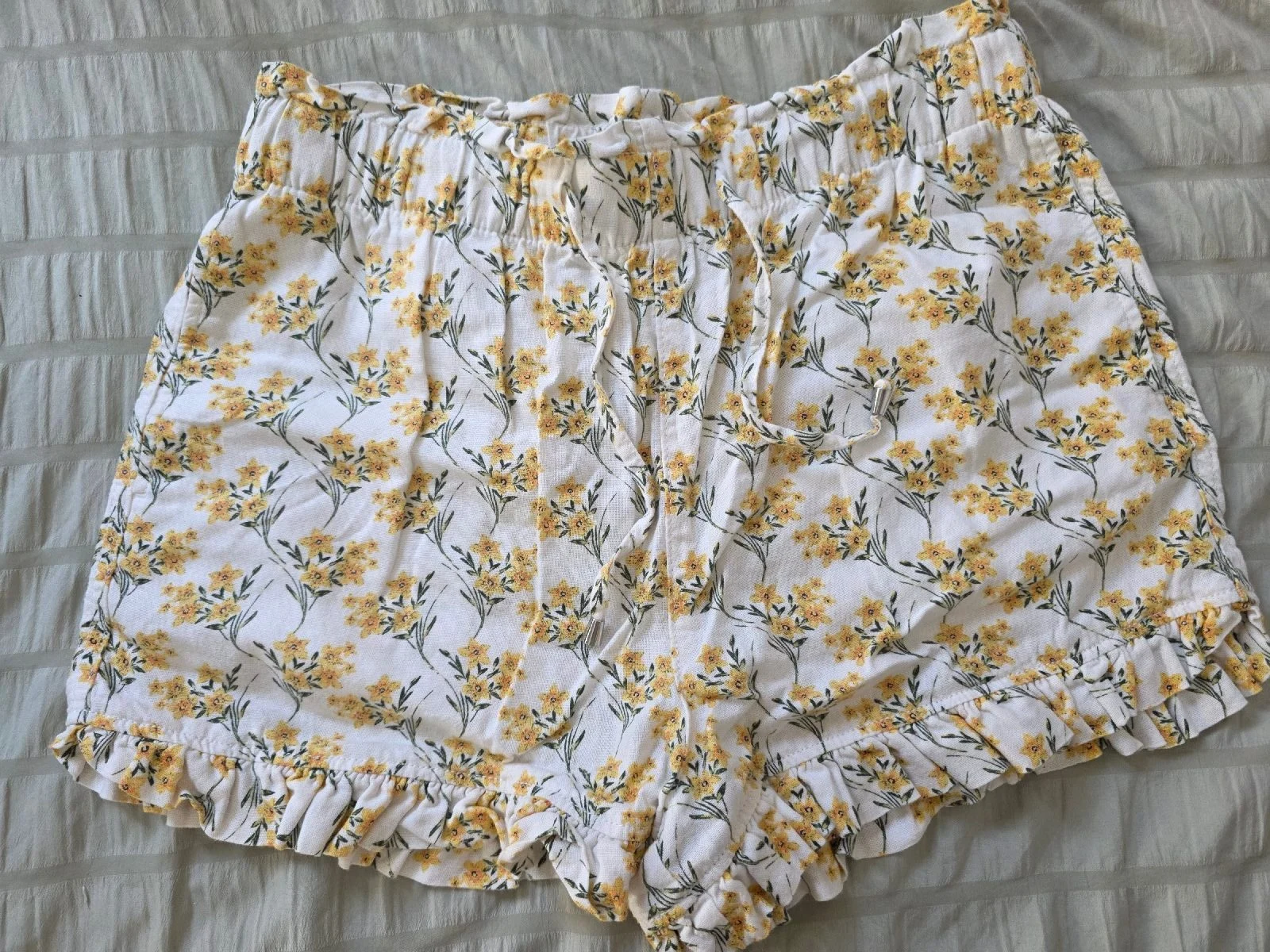 Yellow and white floral shorts