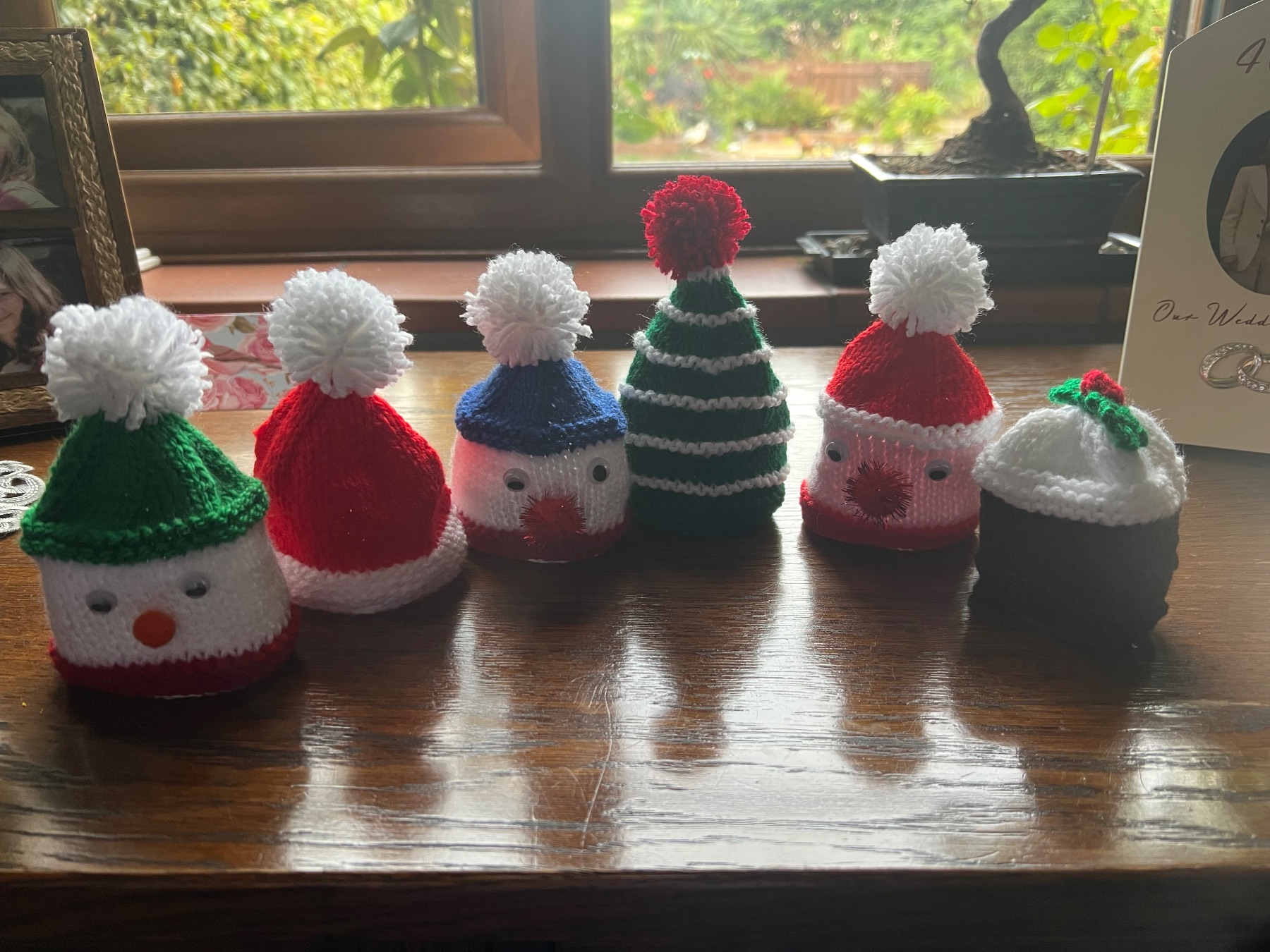 8 knitted chocolate orange covers for Christmas