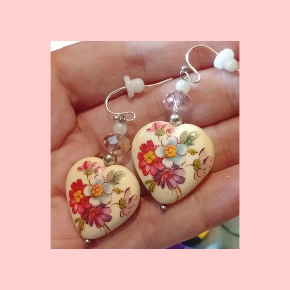 Beautiful floral ceramic heart shaped earrings. Drop style.