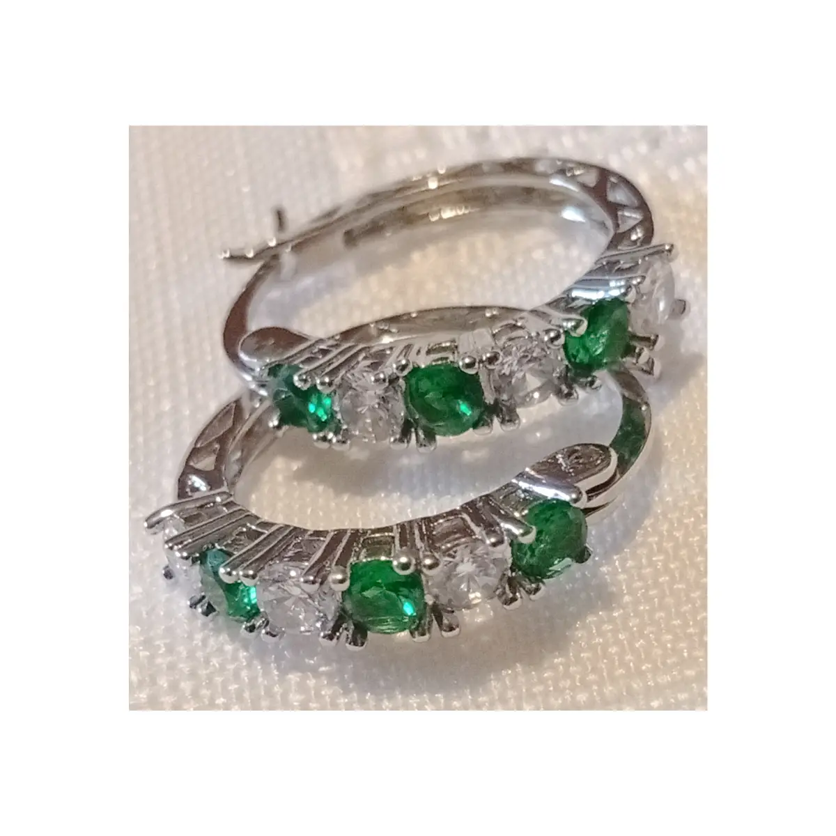 Beautiful faux emerald and diamanté dainty hoop earrings.