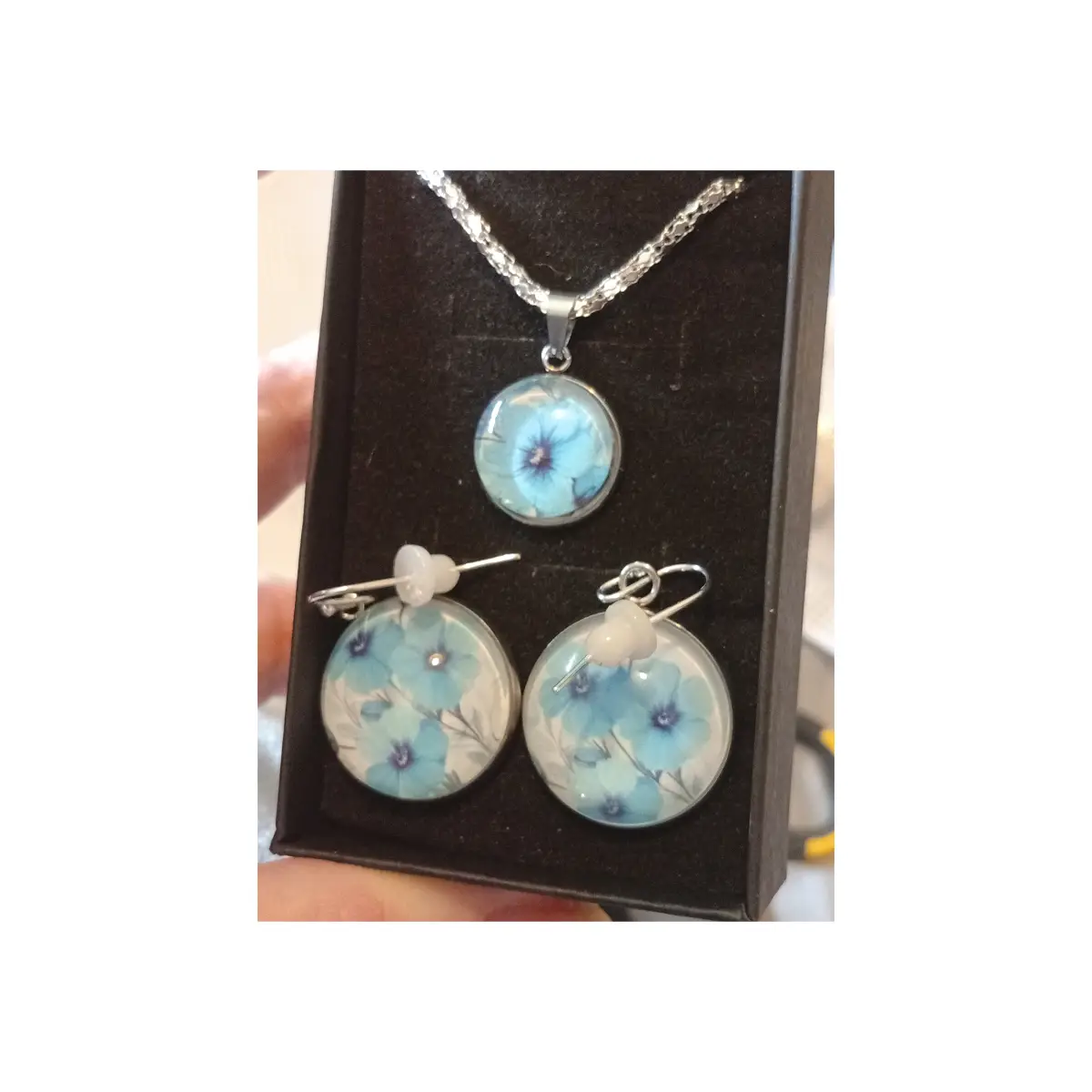 Forget me not design glass cabochon earrings and necklace set.