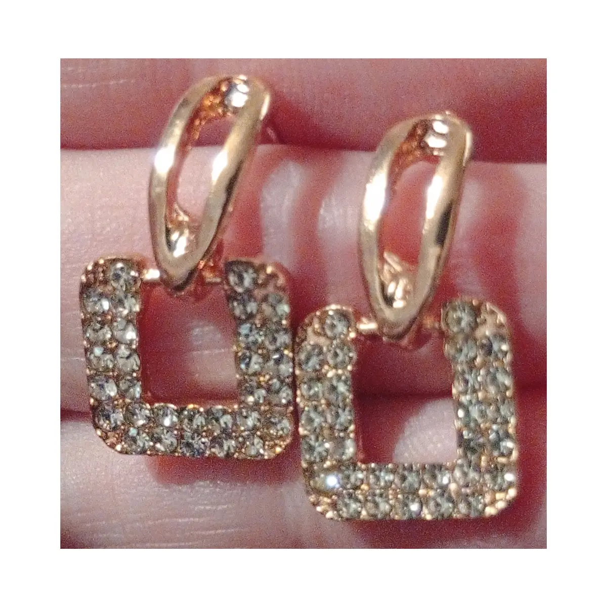 Pretty diamante stud earrings. Boxed.