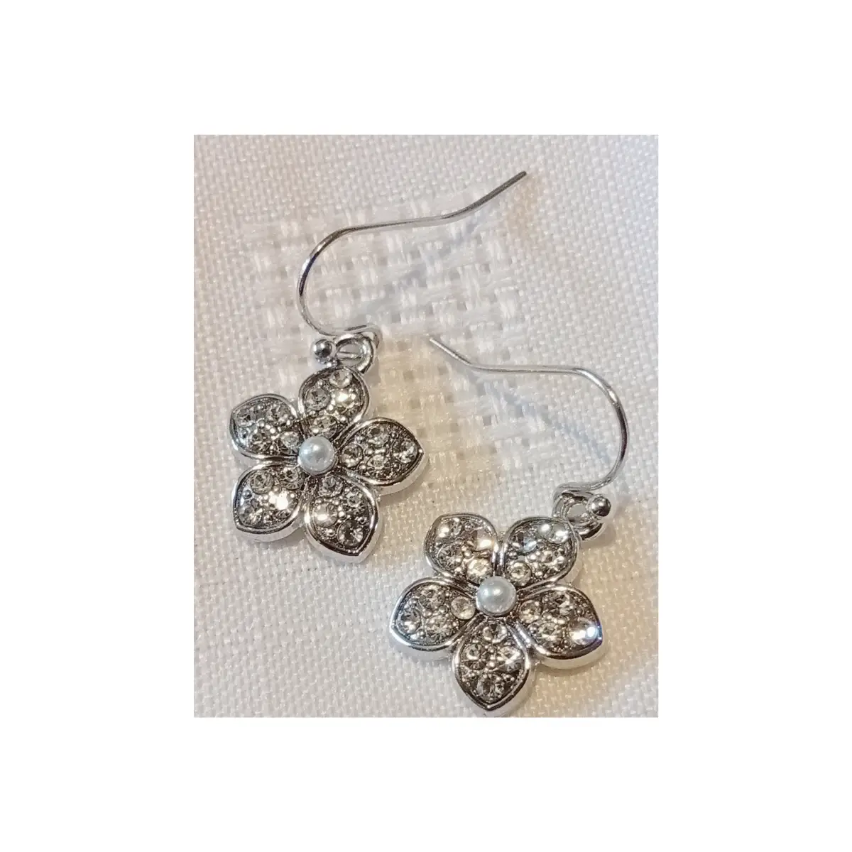 Pretty drop style earrings. Hypoallergenic silvery metal alloy French hooks.