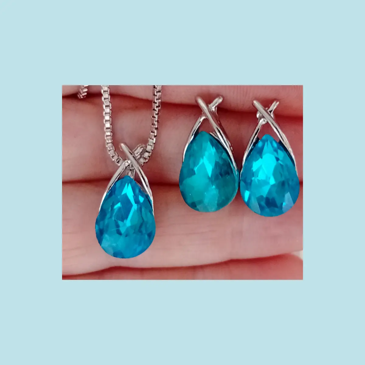 Beautiful faux sapphire earrings and necklace set. Teardrop style. Boxed.