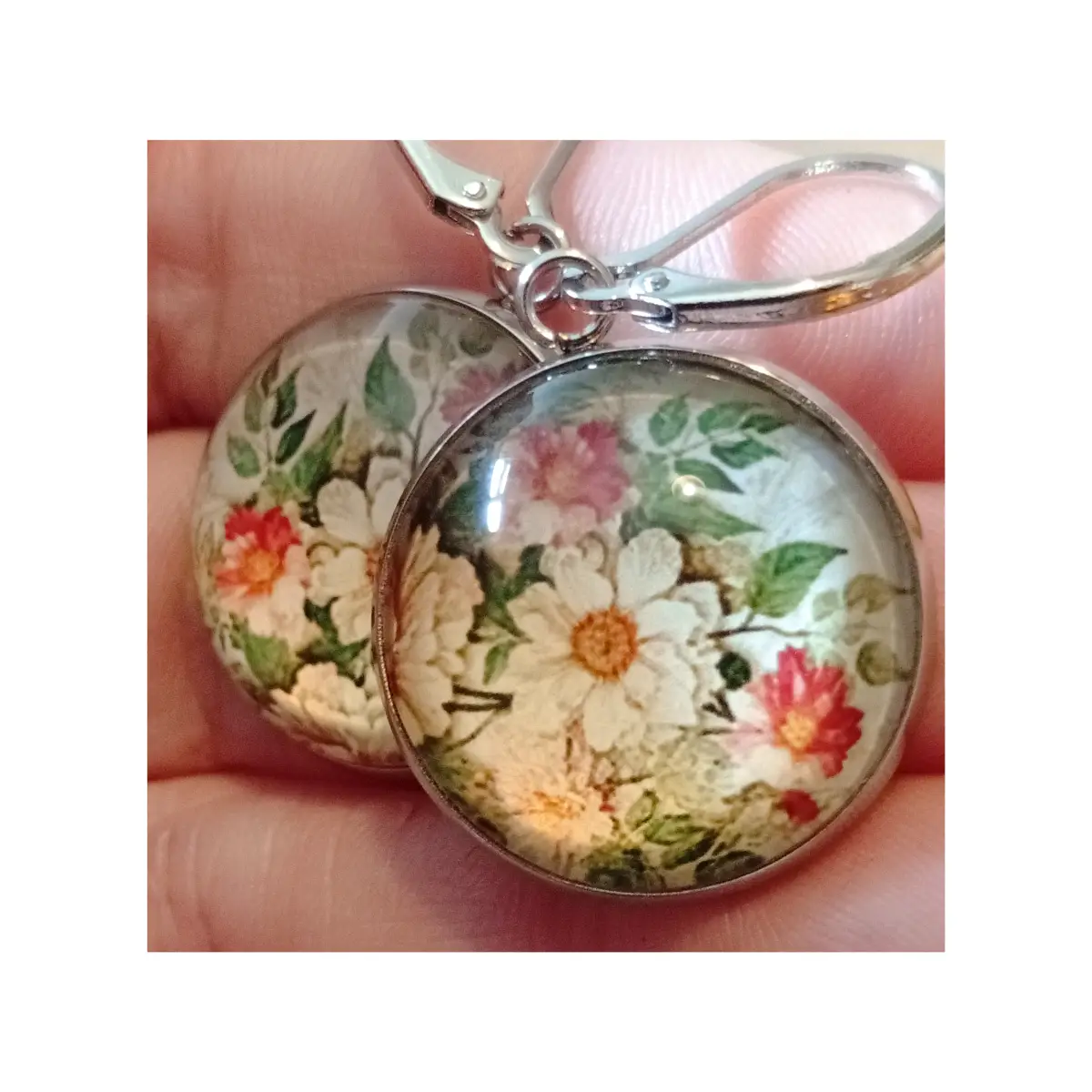 Beautiful floral design glass cabochon earrings. Boxed.
