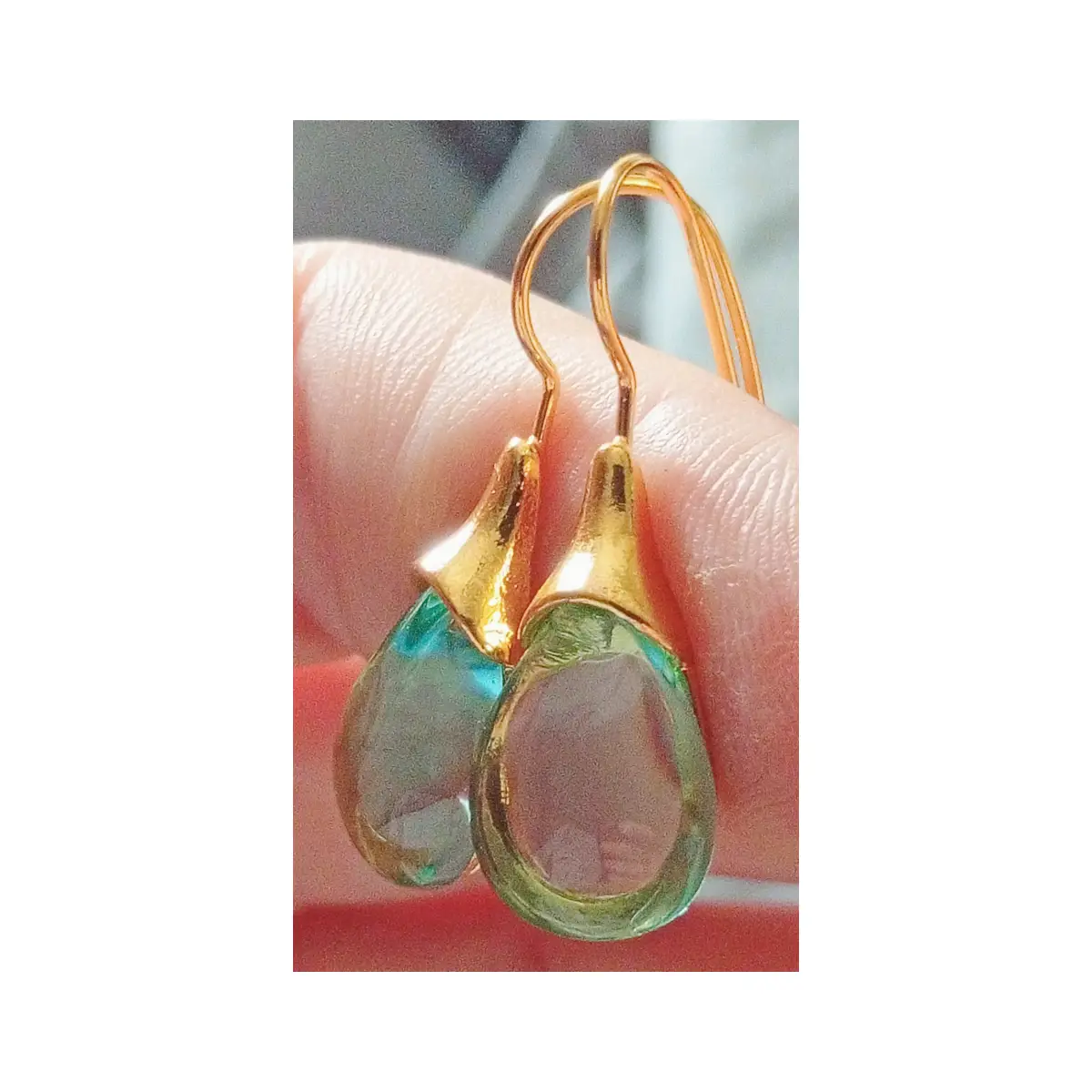 Glass teardrop style earrings. Hypoallergenic.