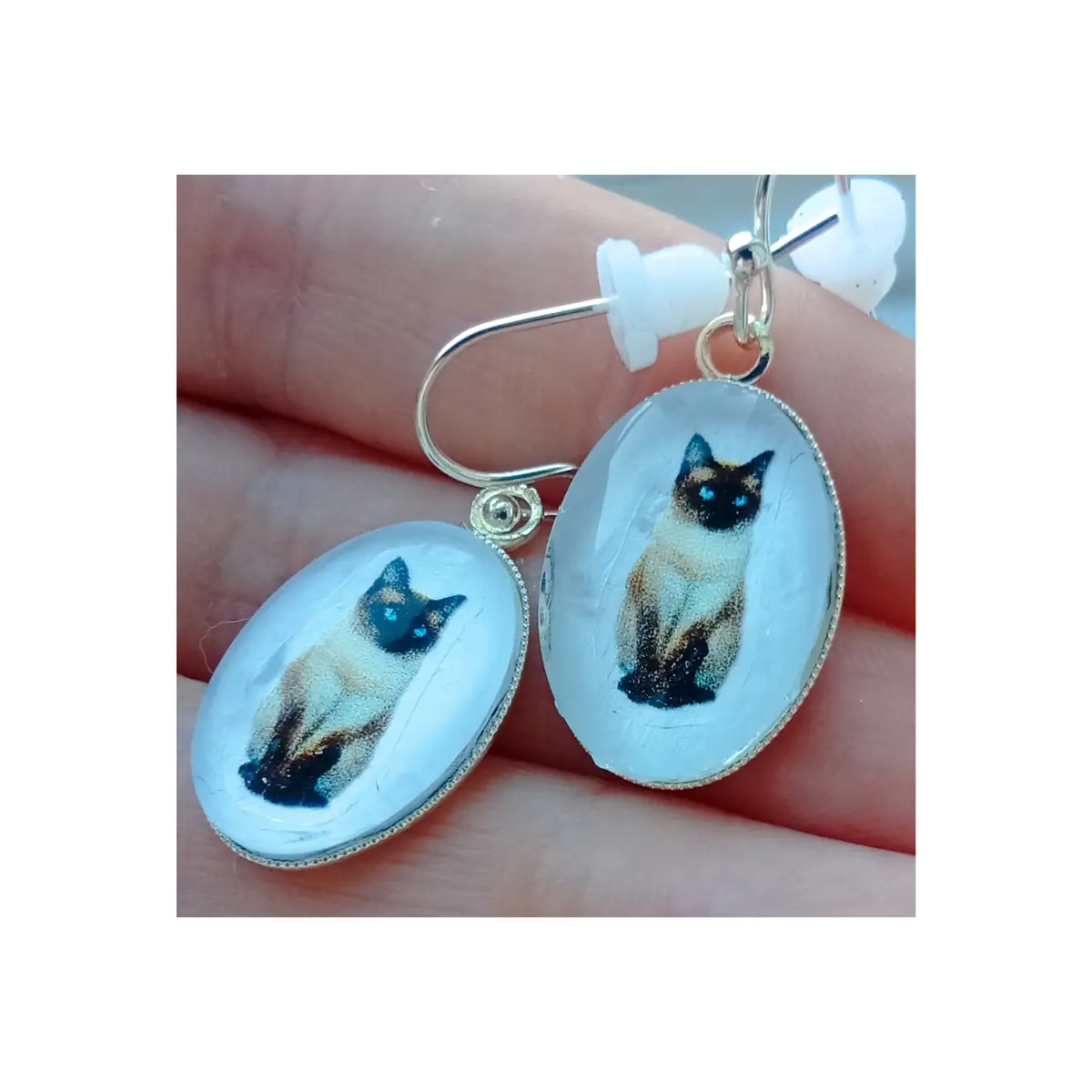 Siamese cat themed glass cabochon earrings. Boxed.