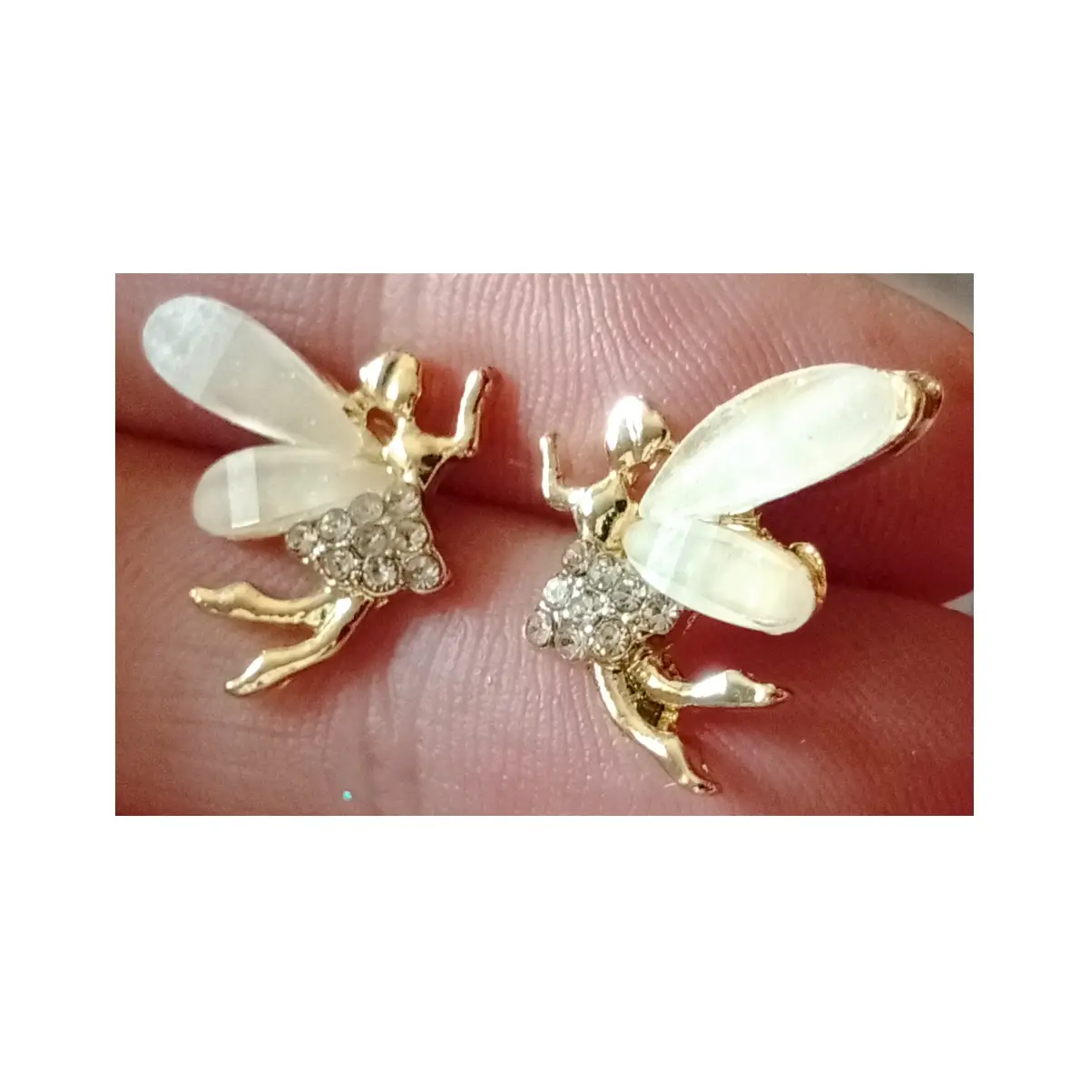 Cute flying fairies stud earrings. Boxed.