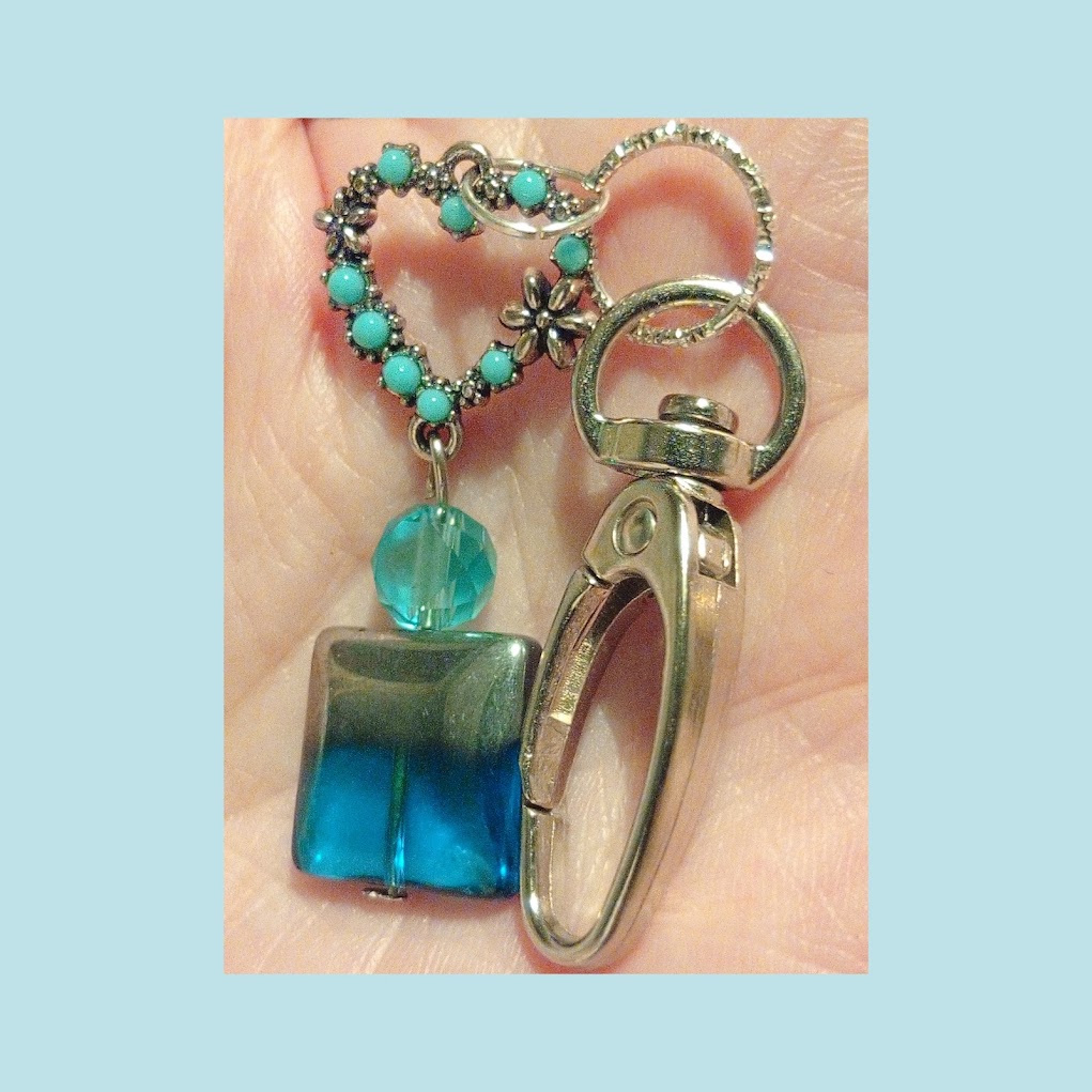Beautiful crafted keyring with hand picked beads. Personalised with any initial charm A-Z.
