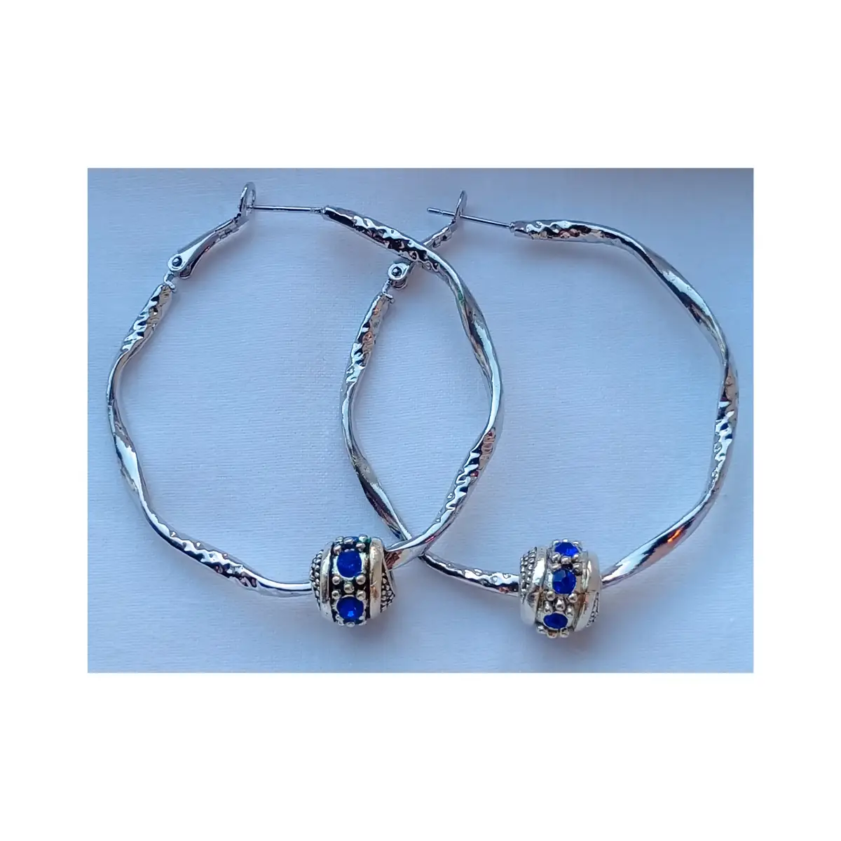 2 pairs of stylish earrings. New in box.