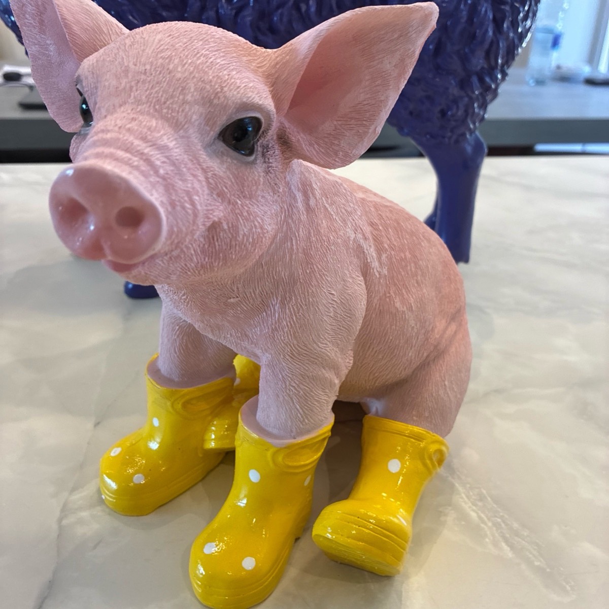 Resin pig sitting in wellies cute