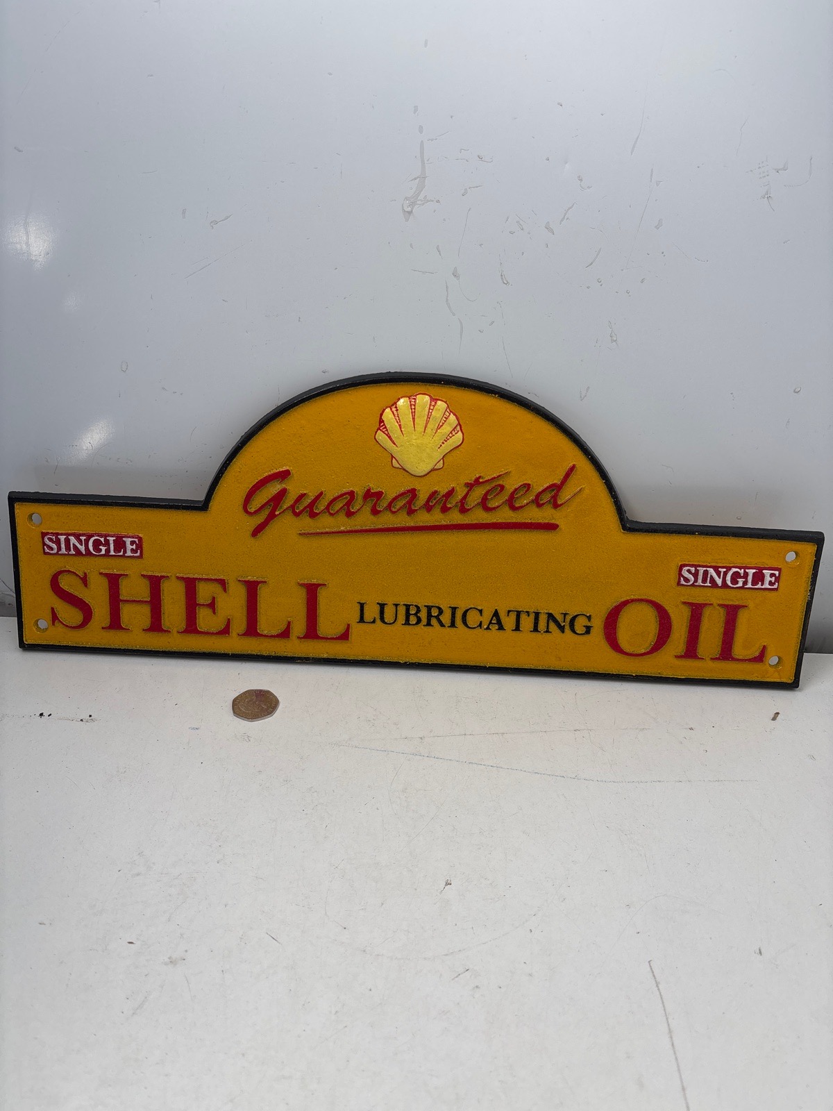 Cast iron repro shell sign
