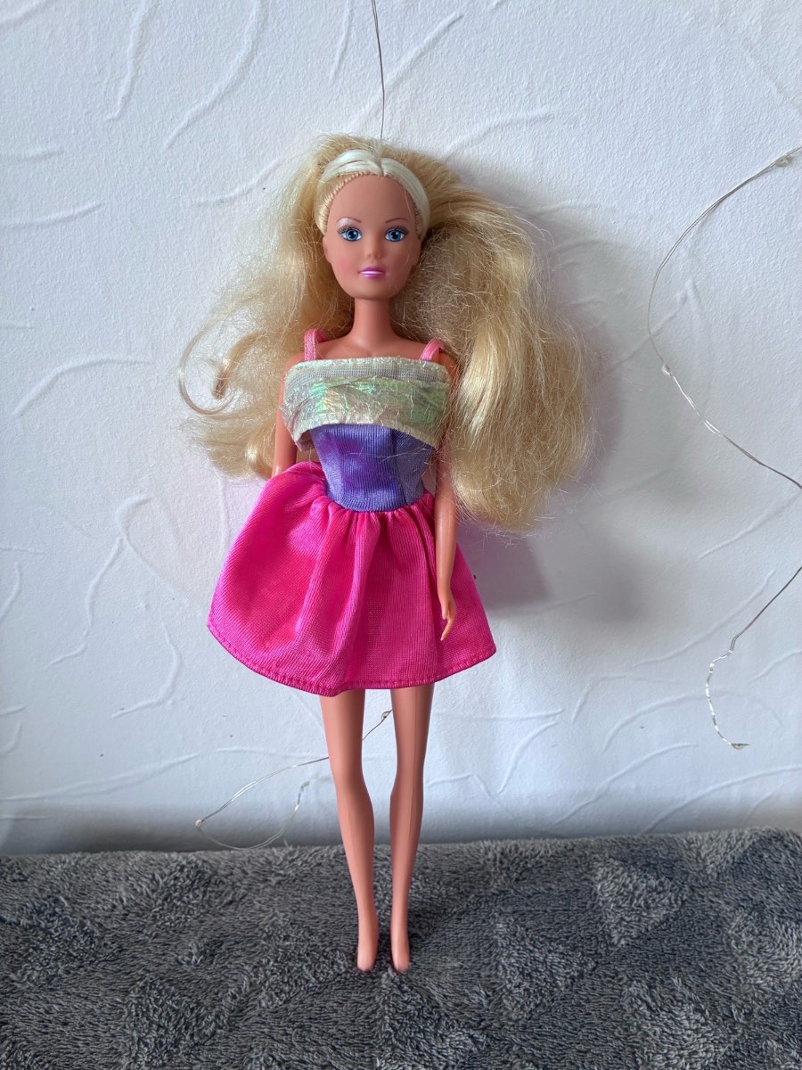 Vintage Simba Steffi Love Doll in an original barbie dress
