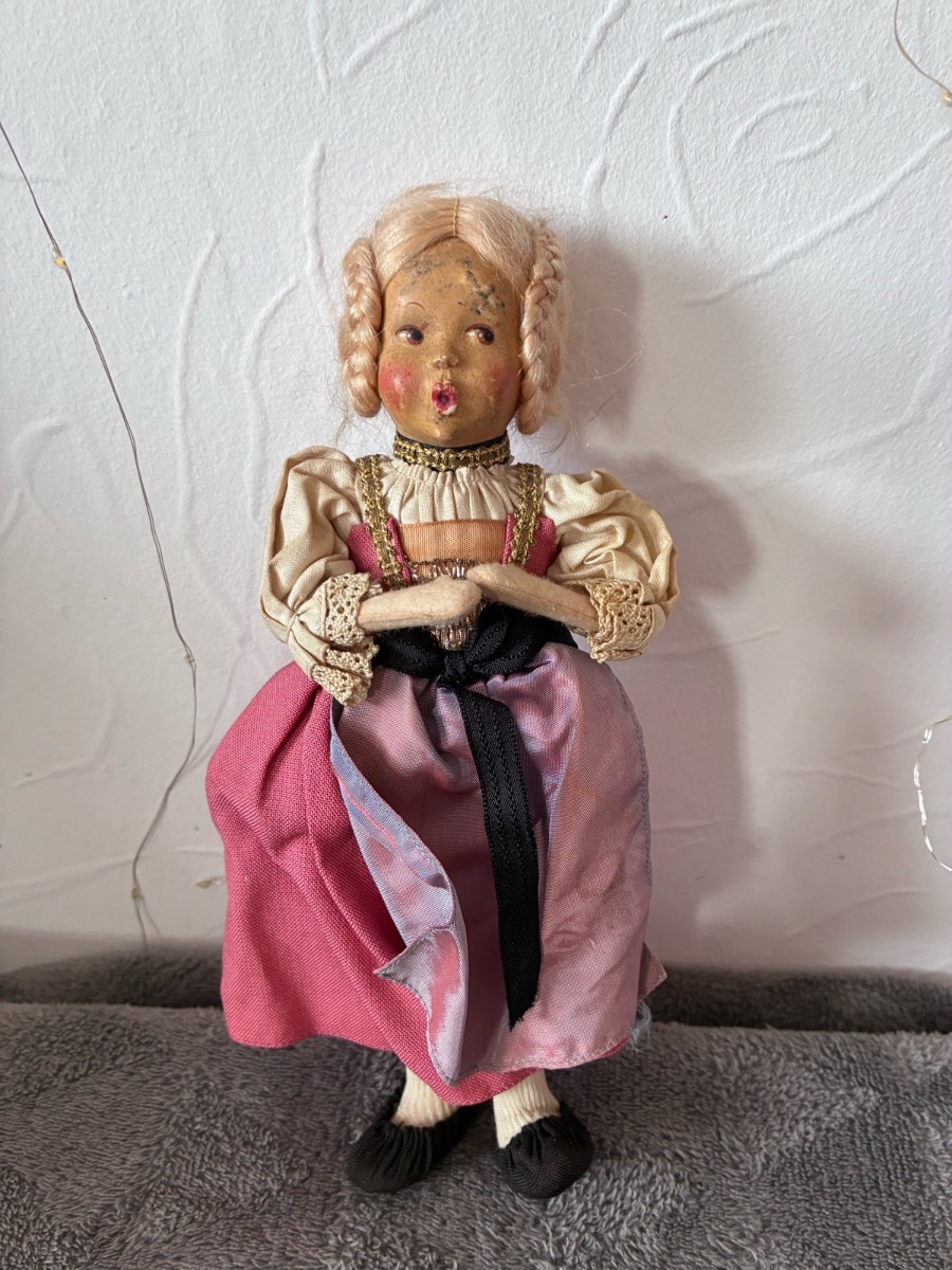 vintage Baitz whistling doll from Austria features a hand-painted Face