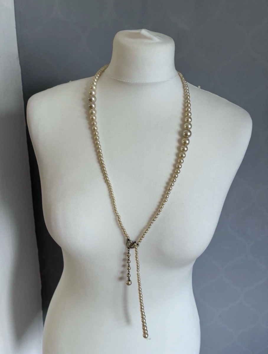 Vintage pearl lariat necklace, characterized by its long, "Y-shape"