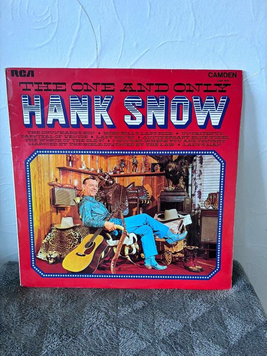 a classic vinyl copy of "The One and Only Hank Snow" LP, released on the RCA Camden label (Catalog:
