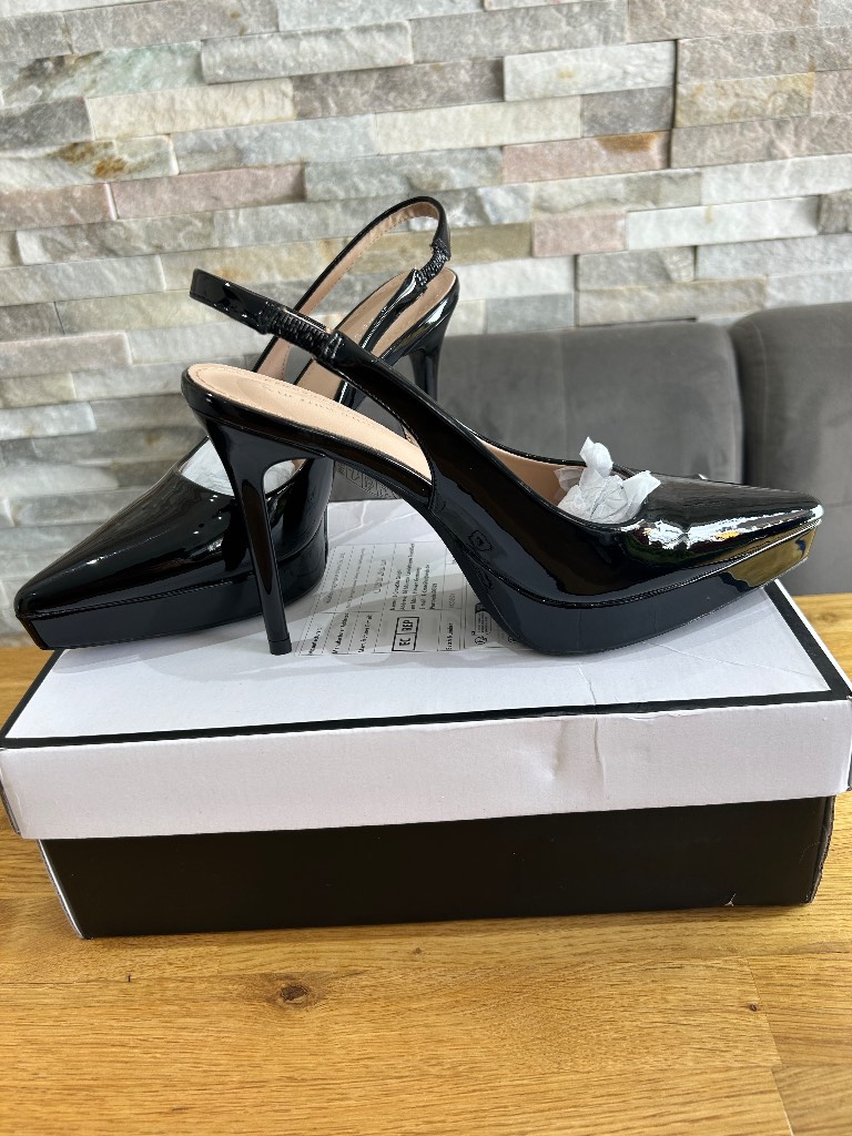 Brand new black sling back heels size 3