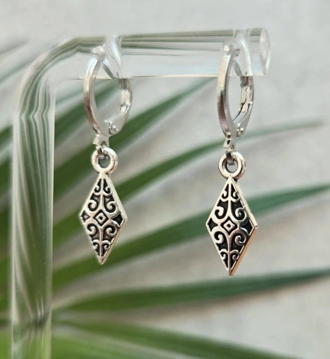 Beautiful intricately detailed charm huggie hoops