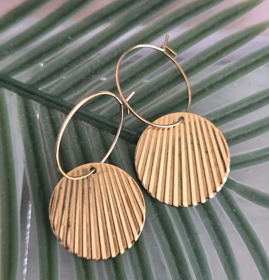 Beautiful shell style gold disc hoops